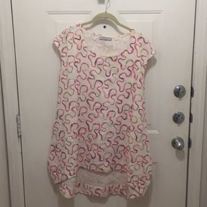 A stunning Bryan Walker high and low dress .